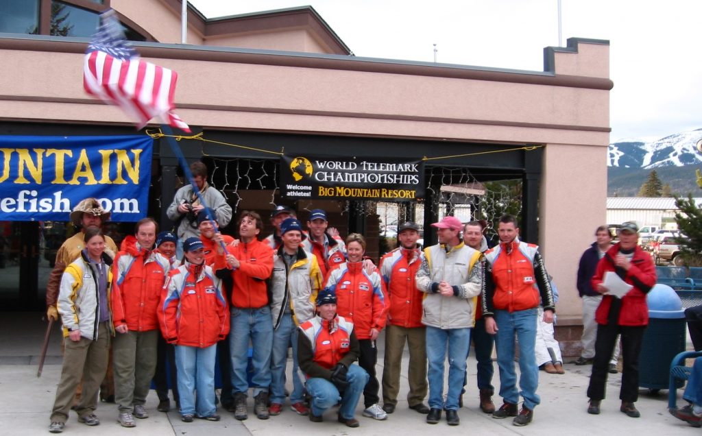 2003 Team at World Championships, Whitefish, MT - left to right:: Mountain man, Carrie Johnson, Jimmy Ludlow, Carole Hill, Natalie Angell, Matt Beedle, Joel Nylander (with flag), Glenn Gustaffson (in back), Peter McMahon, Charlie Dresen, Cody Thompson-McCarthy (kneeling), Chris Coughlin, Chris Rice, Neil Persons, Andrew Minier, Montana Tom (announcing)